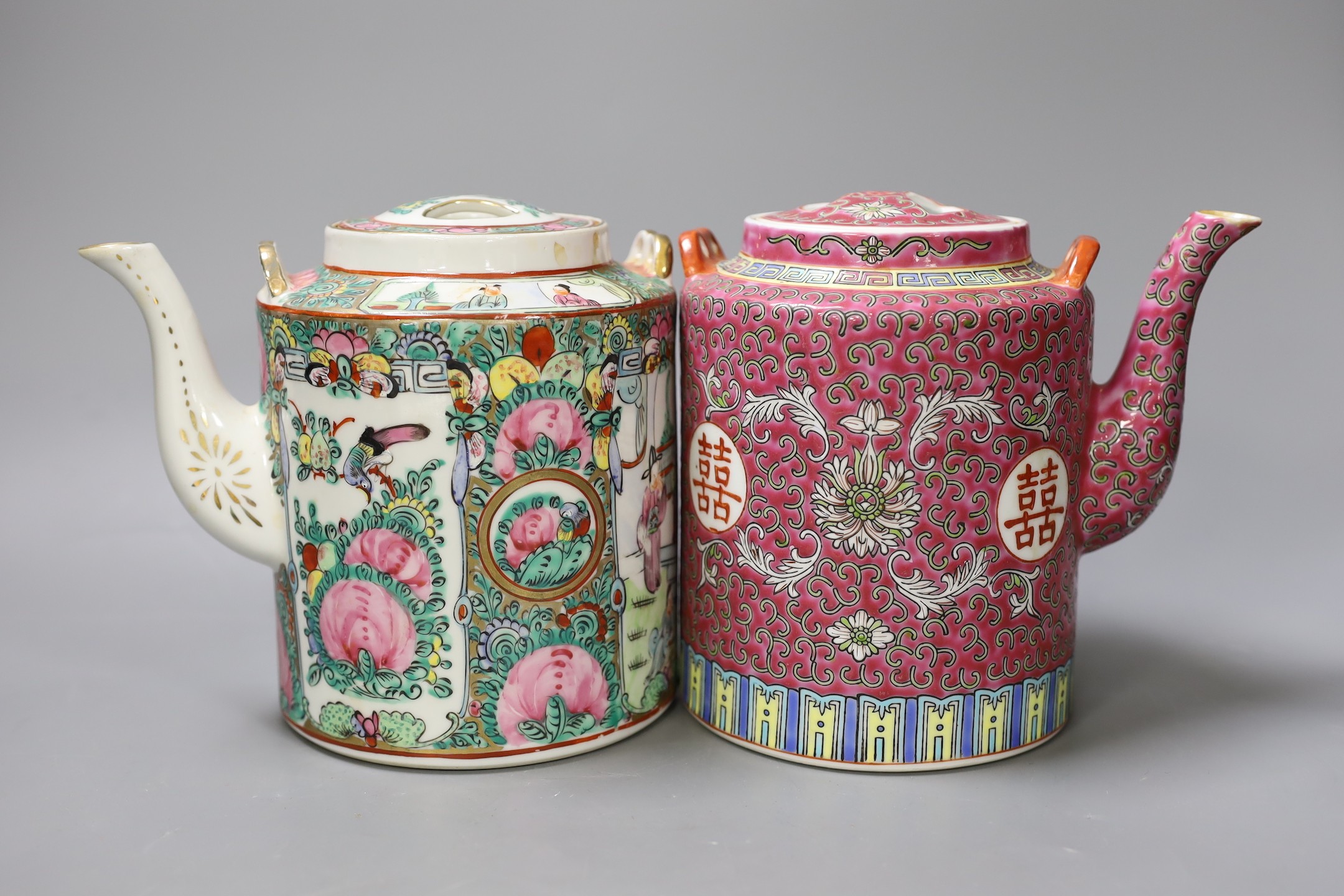 A Chinese wooden figure of Budai, two teapots in baskets and a tea caddy